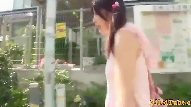 Seductive Japanese Teen 18+ Teases in Tight Black Suit