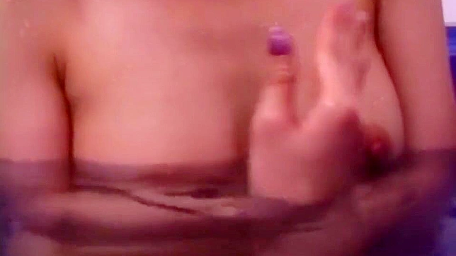 Asian Seductress Soaks Up Pleasure During Steamy Bathtime Fun