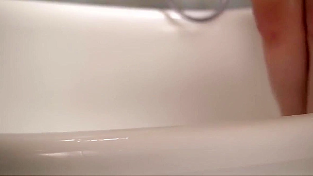 Seductive JAV Star Reiko Asahina Tempts In Steamy Shower