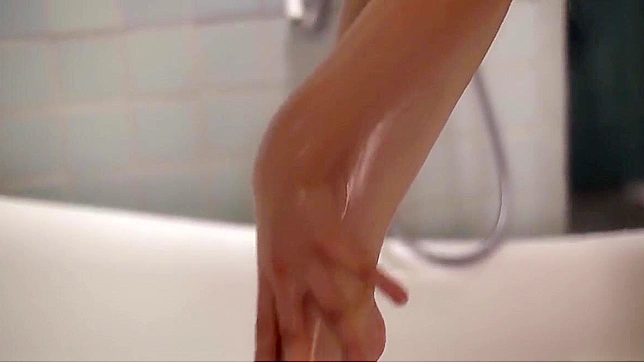 Seductive JAV Star Reiko Asahina Tempts In Steamy Shower