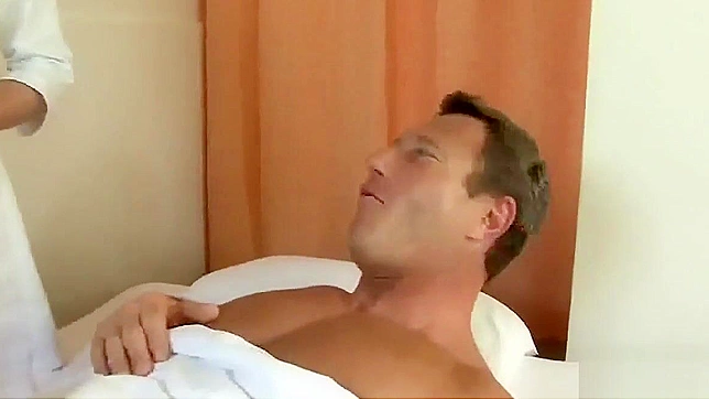 Hot Japanese Nurse Enjoys Steamy Threesome with Big Dicks