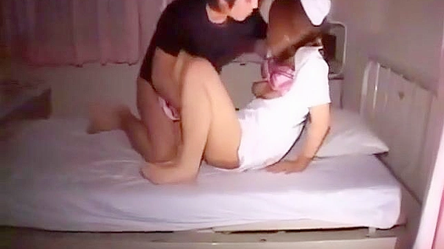 Tattooed JAV Nurse Tempts Hot Doctor into Steamy Bed Action