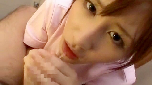 Seductive Japanese Nurse Provides Steamy Handjob Pleasure