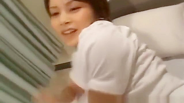Seductive Nurse Emiri Aoi Tempts Patient with Explicit Acts