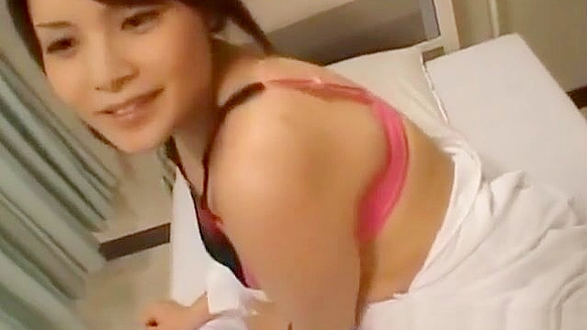 Seductive Nurse Emiri Aoi Tempts Patient with Explicit Acts