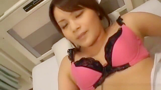Seductive Nurse Emiri Aoi Tempts Patient with Explicit Acts