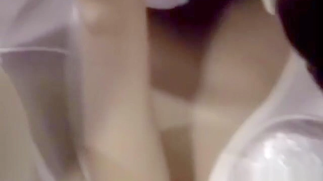 Seductive Japanese Nurse Reveals Her Curves for Intimate Exam