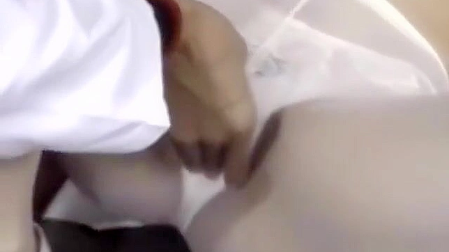 Seductive Japanese Nurse Reveals Her Curves for Intimate Exam