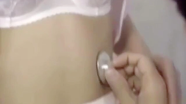 Seductive Japanese Nurse Reveals Her Curves for Intimate Exam