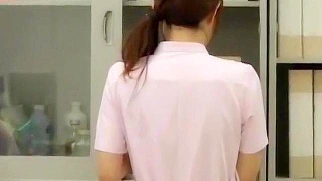 Seductive Japanese Nurse Gives Blowjob In Bathroom Stall