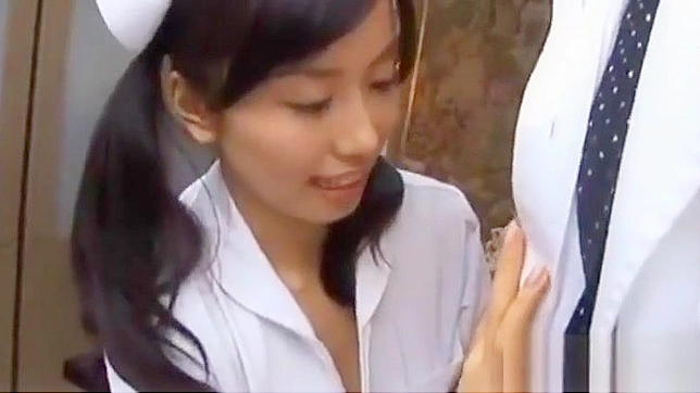 Seductive Japanese Babe Gives Blowjob In Toilet Stall