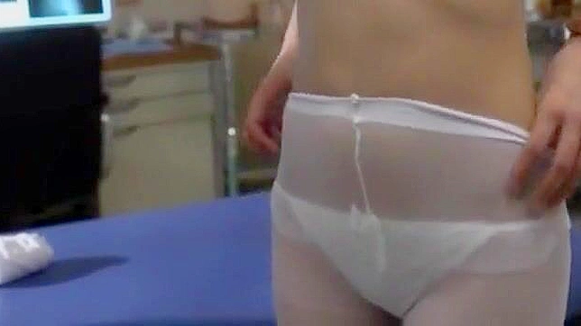 Seductive Japanese Nurse Strips Down in Class Revealing Lush Tits
