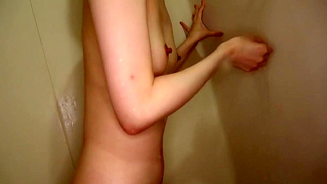 Luscious Blonde Gets Steamy in Her Sultry Shower Fuck!