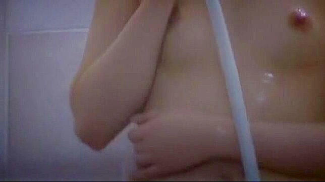Sensual Riri Kuribayashi Masturbates Seductively Under Shower Jet