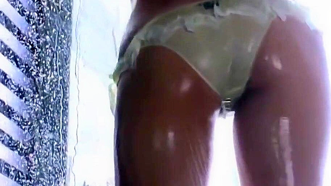Sultry JAV Star Risa Drenches in Hot Body Oil Action