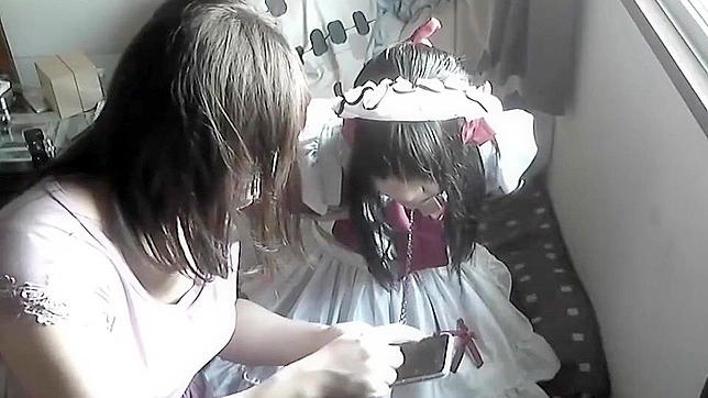 Seductive Maid Submits to Bondage Pleasure in Steamy Encounter