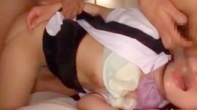 Hot Japanese Babe Takes Two Cocks Simultaneously
