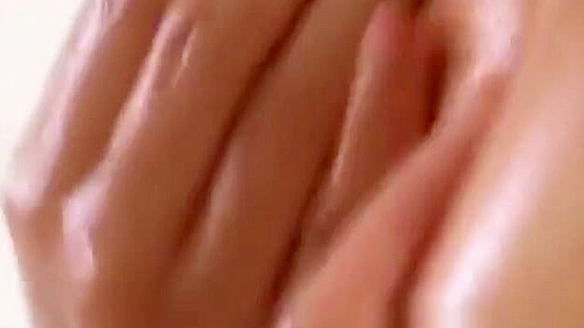 Oiled Japanese Beauty Teases With Seductive Fucking