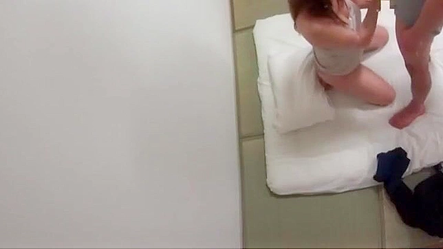 Hot Japanese beauty gets loaded during wild bukkake session