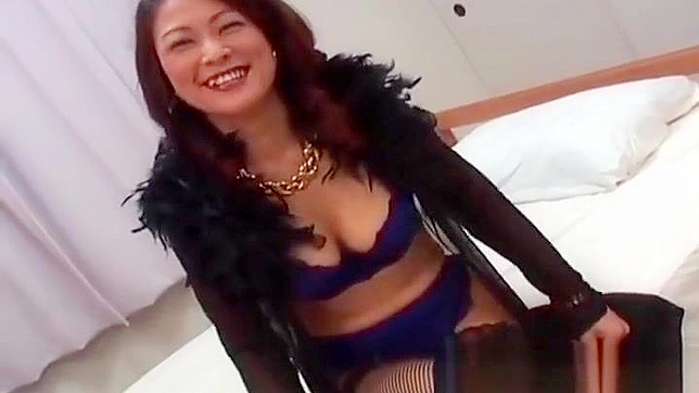 Gorgeous Japanese Temptress Teases with Her Bountiful Breasts