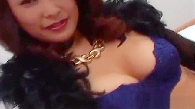 Gorgeous Japanese Temptress Teases with Her Bountiful Breasts