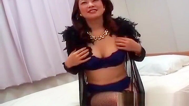 Gorgeous Japanese Temptress Teases with Her Bountiful Breasts