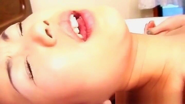 Voluptuous Japanese Temptress Teases in Sultry Panties