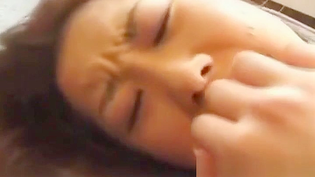 Sultry Redhead Teases Her Wet Pussy in Steamy JAV Scene