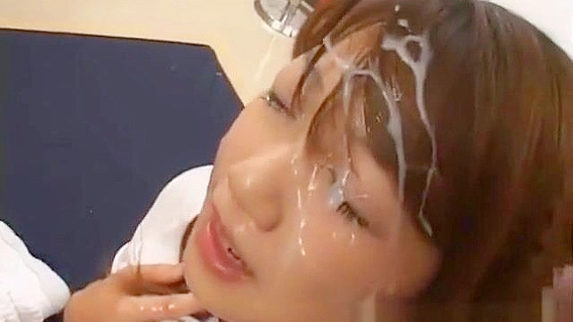 Sultry Enchantress Takes Facial Loads in Hot Bukkake Orgy