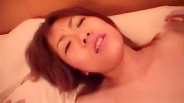 Seductive Japanese Beauty Reveals Her Lush Hairy Pussy