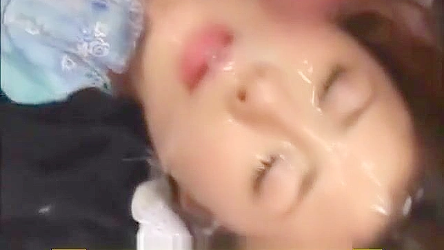 Japanese Temptation Gets Drenched In Semen During Wild Bukkake