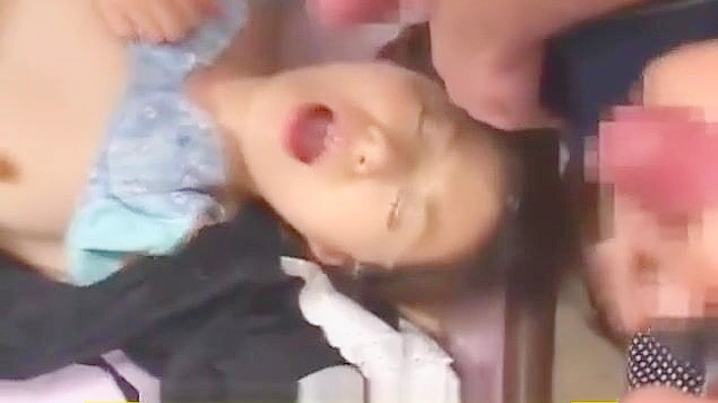 Japanese Temptation Gets Drenched In Semen During Wild Bukkake