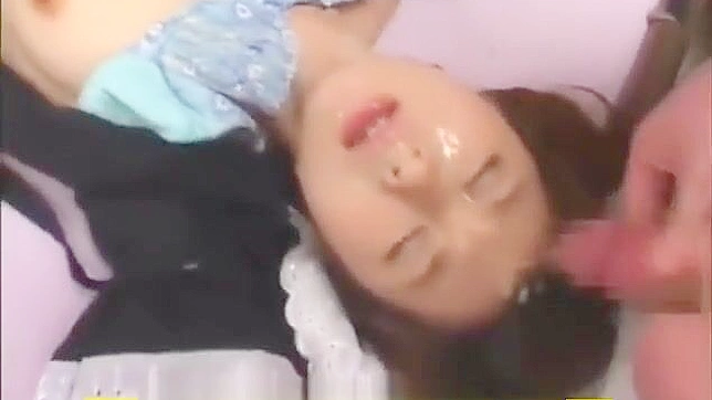 Japanese Temptation Gets Drenched In Semen During Wild Bukkake