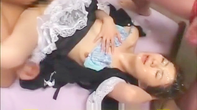 Japanese Temptation Gets Drenched In Semen During Wild Bukkake