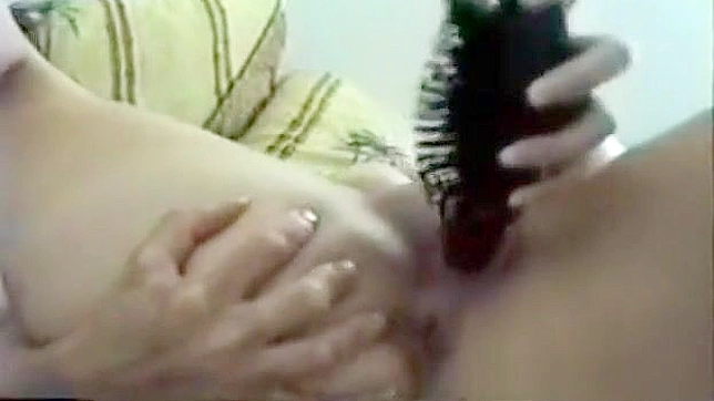 Alluring Chinese Amateur Explores Her Paradise With Dildo Delights