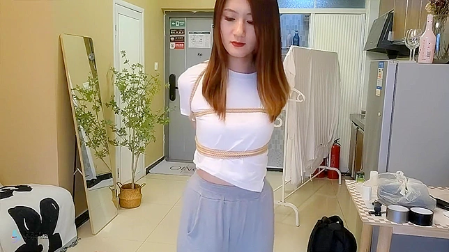 Chinese Beauty Gets Tied Up For Sensual Bondage Fun