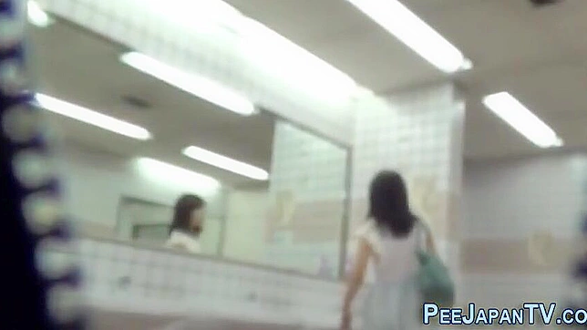 Seductive Japanese Newcomer Charms While Peeing On Cam Live