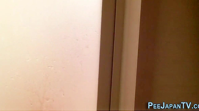 Wet Japanese Beauty Squirts Hotly During Steamy Piss Adventure
