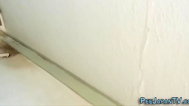 Wet Japanese Beauty Squirts Hotly During Steamy Piss Adventure