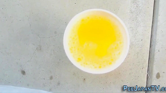 Wet Japanese Beauty Squirts Hotly During Steamy Piss Adventure