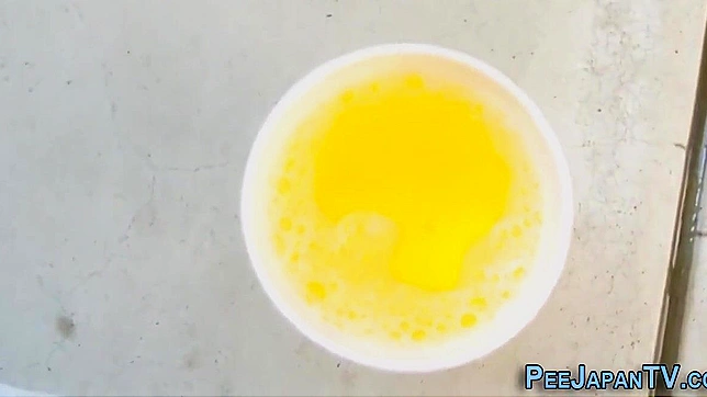 Wet Japanese Beauty Squirts Hotly During Steamy Piss Adventure