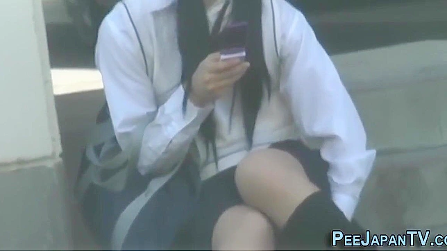 Publicly Exposed Japanese Beauty Pees Uncontrollably Live On-Camera