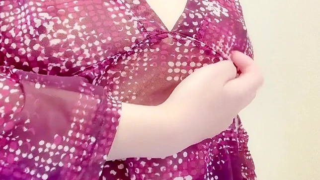 Seductive Japanese Chick Offers Luxurious Boob Massage Bliss