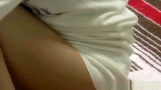 Caught Asian Babe Fingers Her Pussy Under Watchful Eyes.