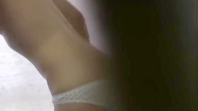 Caught Asian Babe Fingers Her Pussy Under Watchful Eyes.