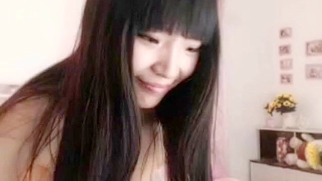 Sexy Big-Titted Asian Shows Off Her Wild Webcam Masturbating Skills