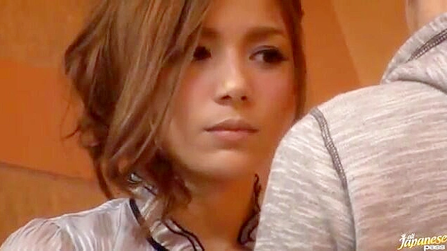Seductive Japanese Cutie Shows Off Solo Pleasure Techniques