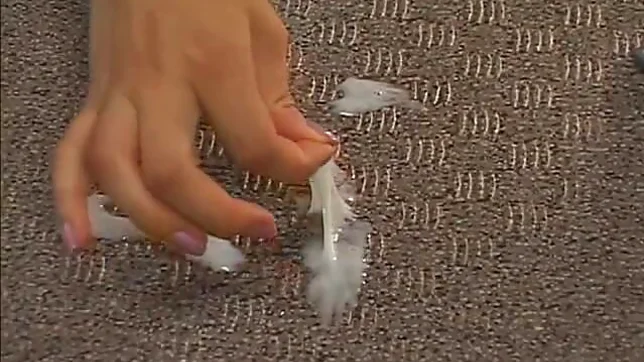 Pretty Japanese model fondles her wet pussy 2