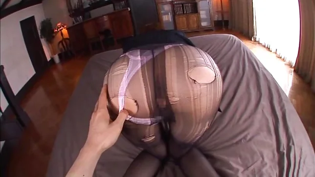 Kinky office lady in pantyhose Tsubasa Amami gives a foot job 5