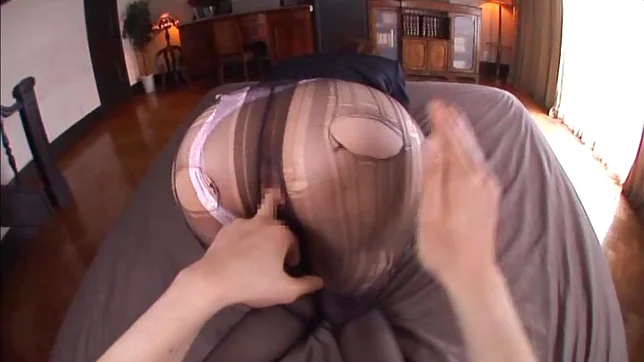 Kinky office lady in pantyhose Tsubasa Amami gives a foot job 5